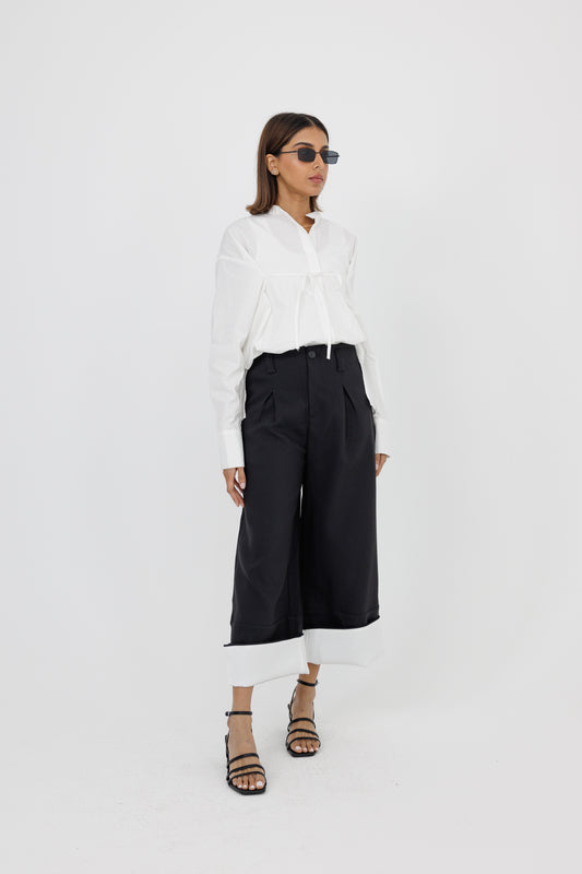 Black Pants with White Fold